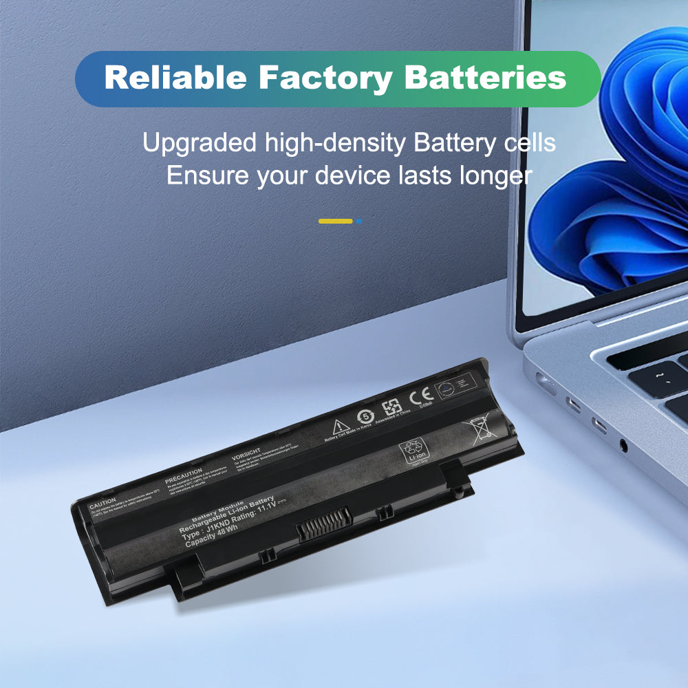 J1KND 48Wh laptop battery on a desk beside a laptop, highlighting upgraded high-density cells for longer runtime